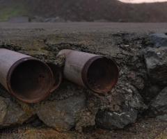 CONSTRUCTION AND REHABILITATION OF STORM DRAINAGE, SEWER LINES, OIL WASTE DISPOSAL AND SEPTIC TANKS